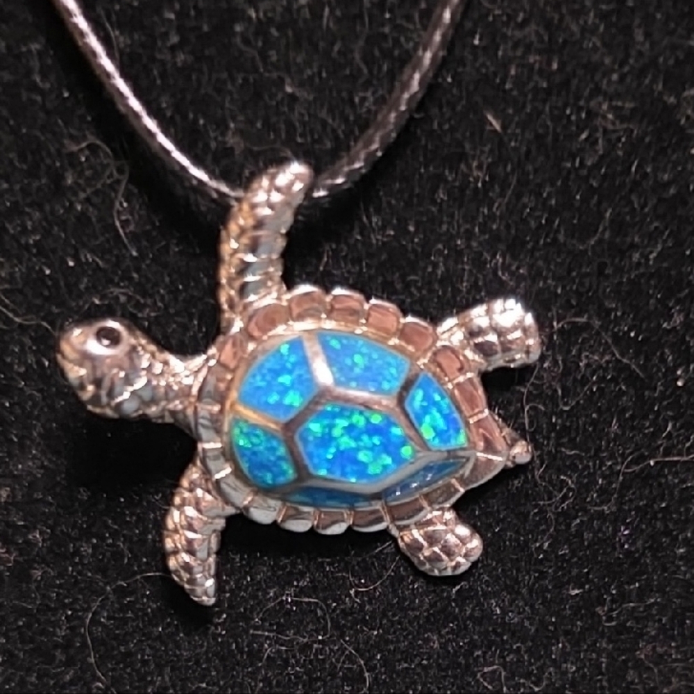 Silver Turtle Pendant Necklace with Blue Accents